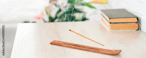 incense sticks on incense stands are on the table, an addition to the interior, meditation photo