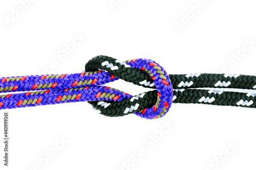 Close up of a square knot, reef knot shot on a white background