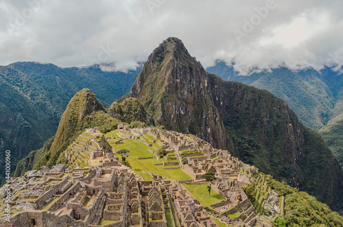 View of Machu Picchu lost city with Huayna Picchu mountain. Ruins of ancient inca civilization in the sacred valley of Cusco Province. Peru, South America