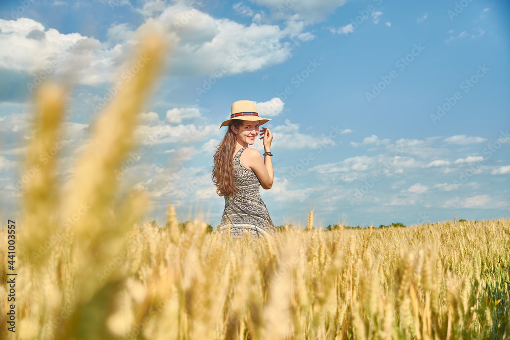 Young girl with long hair in a field Young girl with long hair in a field