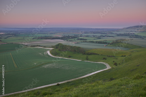 A panoramic view from Bo Peep Hill on top of South Downs National Park overlooking the East Sussex Weald.