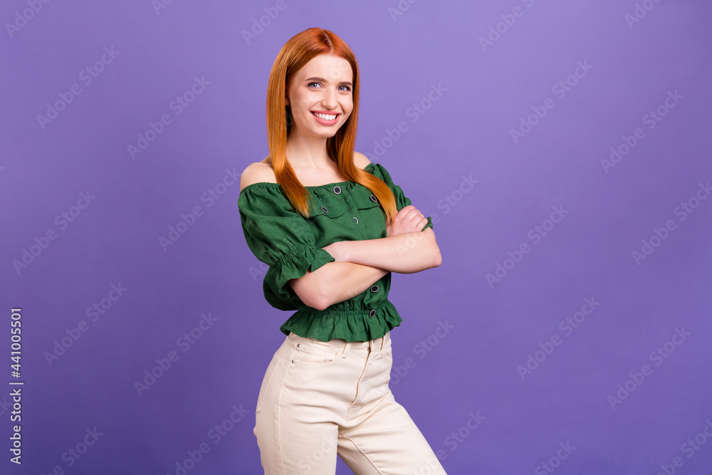 Photo of sweet shiny young lady wear green blouse arms crossed smiling isolated purple color background Photo of sweet shiny young lady wear green blouse arms crossed smiling isolated purple color background