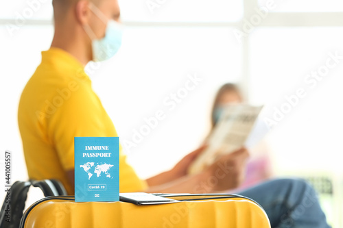 Immune passport on suitcase...