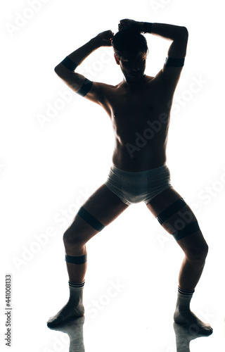 Sportive athletic man's body, wearing white boxer