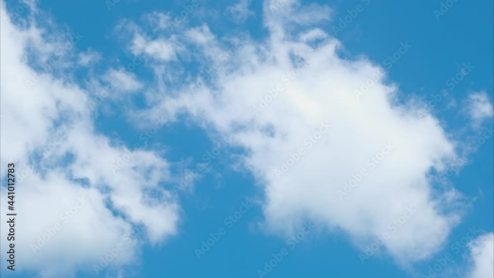 Blue sky white clouds. Puffy fluffy white clouds. Summer blue sky time lapse. Sky with clouds weather nature cloud blue. Summer blue sky time lapse. Nature background. Soft white Blue sky white clouds. Puffy fluffy white clouds. Summer blue sky time lapse. Sky with clouds weather nature cloud blue. Summer blue sky time lapse. Nature background. Soft white