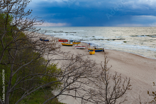 Kolorowe kurty rybackie na bałtyckiej plaży, Rewal, Polska photo