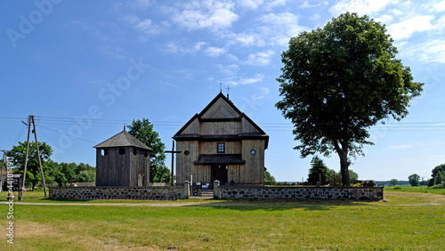The belfry built in 1792 with the church of St. John the Baptist in the village of Gąsiorowo in Masovia, Poland. The photos show a general view and architectural details of the temple and belfry. © Jacek Sakowicz