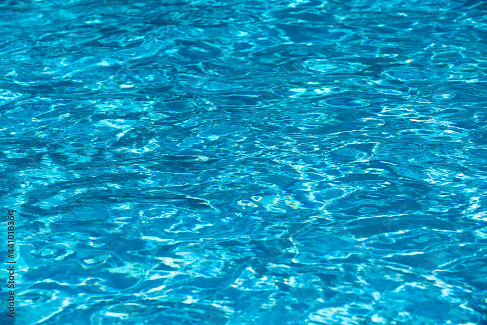 Tansparent clear calm water surface texture. Abstract nature background. Sea water pattern. Tansparent clear calm water surface texture. Abstract nature background. Sea water pattern.