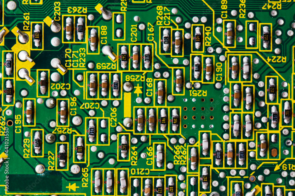 Fotka „Green printed circuit board PCB with chip texture or background ...
