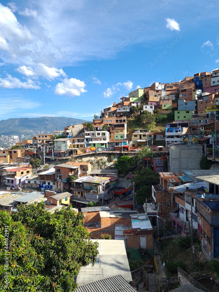 Medellin, Antioquia, Colombia. February 3, 2021: Colorful landscape with houses and facades in commune 13.