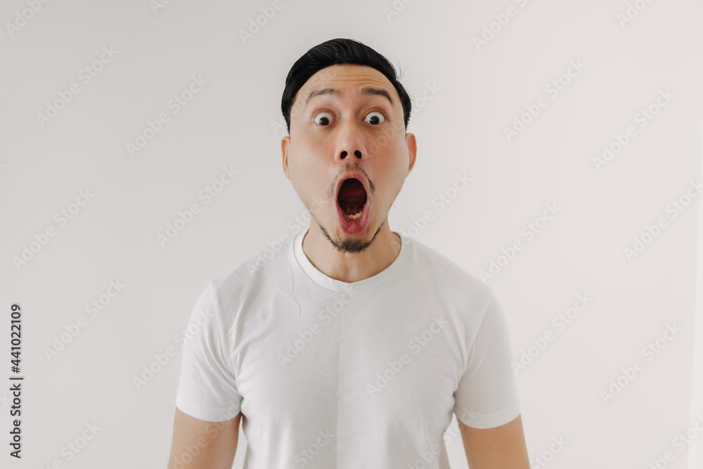 Funny shocked and surprised face of Asian man isolated on white background.  Stock Photo | Adobe Stock