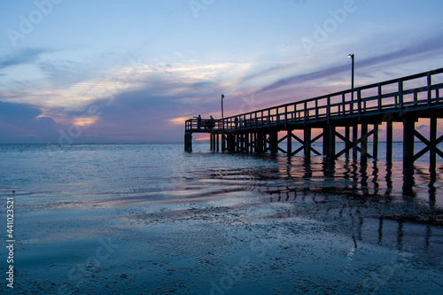 pier at sunset on mobile bay 