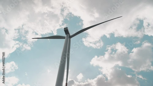The wind turbine nacelle turns in the direction of the wind. The start of the rotation of the blades to generate clean electricity.
