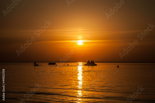 Summer sunset at sea. A resort place to relax at sunset. text place.