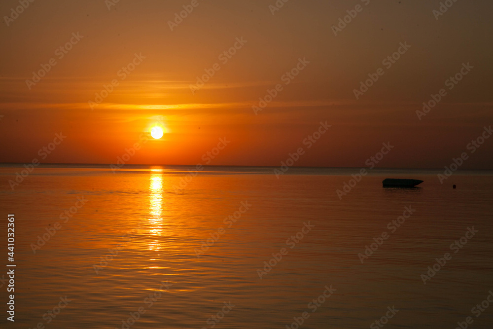 Summer sunset at sea. A resort place to relax at sunset. text place.