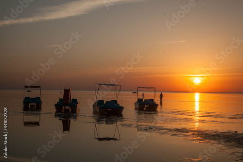 Summer sunset at sea. A resort place to relax at sunset. text place.