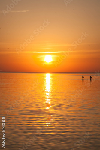 Summer sunset at sea. A resort place to relax at sunset. text place.