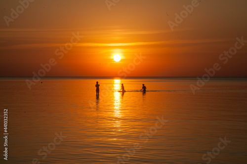Summer sunset at sea. A resort place to relax at sunset. text place. © Natalija