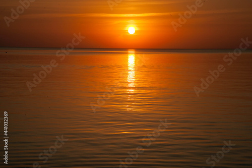 Summer sunset at sea. A resort place to relax at sunset. text place.