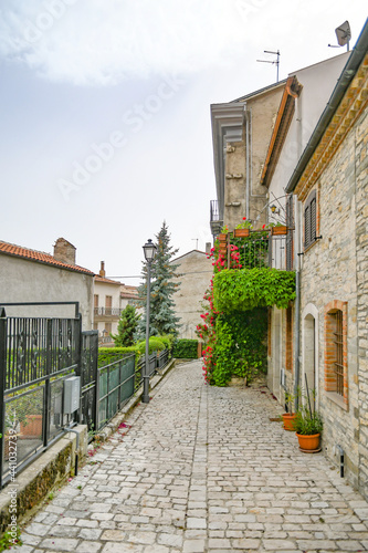 A small street between the old houses of Pietrabbondante  a medieval village in the mountains of the Molise region in Italy.