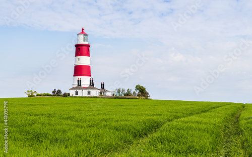 Happisburgh lighthouse on top of a hill