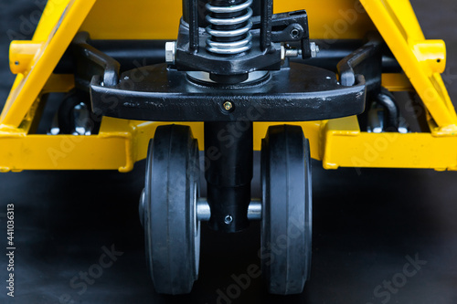 Wheelbarrow for transportation of pallets with cargo, close-up. photo