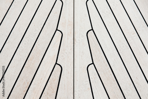 Texture of teak deck on a yacht closeup.