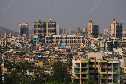 Obraz na plátně Panoramic aerial view of polluted, crowded extended suburbs of Navi Mumbai (New Bombay) which have shown an uncontrollable surge in virus cases pandemic