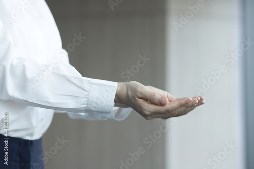 Businesswoman with open hand,Holding,giving, showing concept