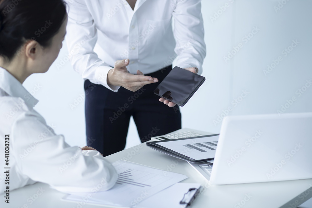 Business people using digital table in meeting Business people using digital table in meeting