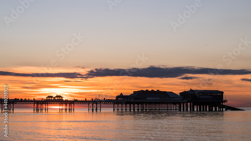 Sunset behind Cromer Pier © Jason Wells