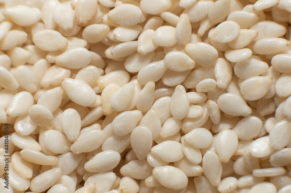 Sesame. Background from sesame seeds close up. Seeds Sesame. Background from sesame seeds close up. Seeds