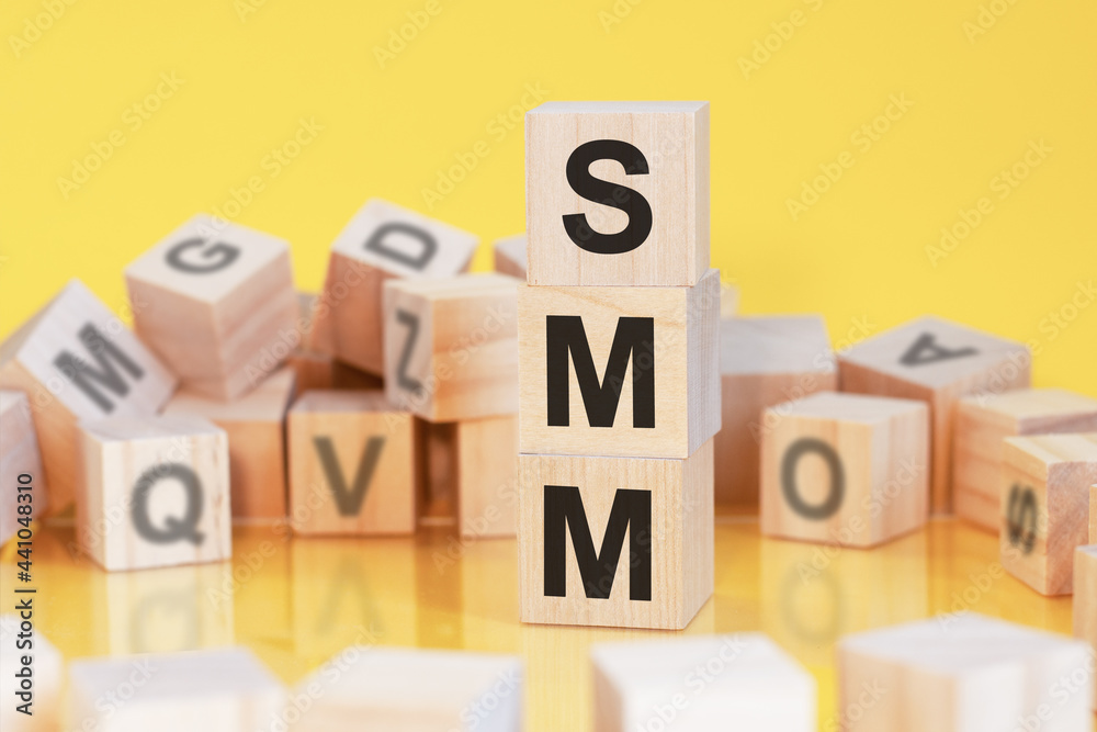 acronym smm from wooden blocks with letters, concept acronym smm from wooden blocks with letters, concept