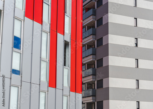 Modern and avant-garde buildings, with straight lines, and red and gray colors. photo