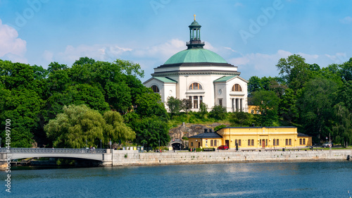 Stockholms Skeppsholmen and the Skeppsholmen church (Skeppsholmskyrkan), as seen from the city's old town and royal castle. Tourism and cityscape concept. photo