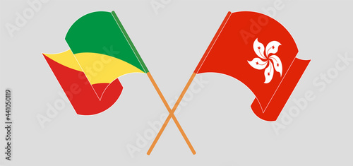 Crossed and waving flags of Republic of the Congo and Hong Kong