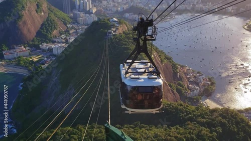 Sugar Loaf Hill and the cable car going up in the late afternoon in Rio de Janeiro photo