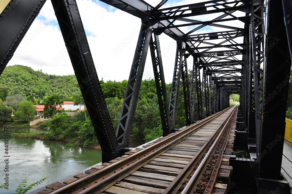 Fototapeta premium Metal bridge over a river