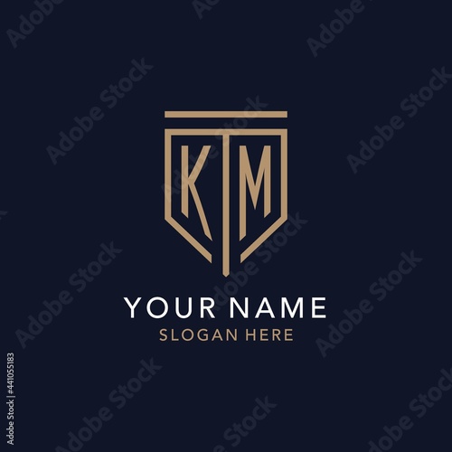 KM initial logo monogram with simple luxury shield icon design