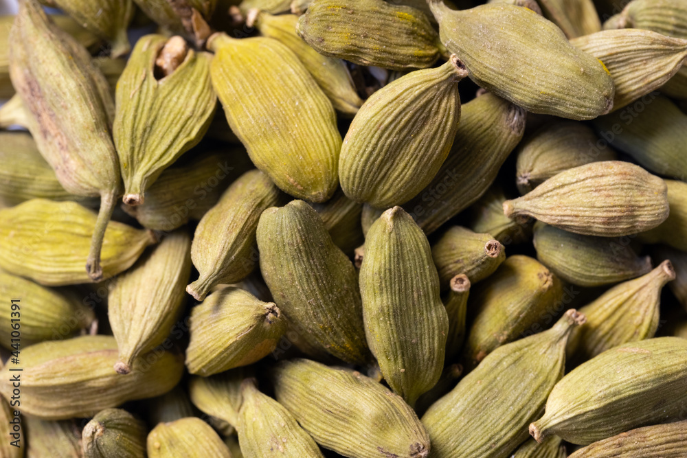 Cardamom green super food indian aroma spice close up background texture Cardamom green super food indian aroma spice close up background texture
