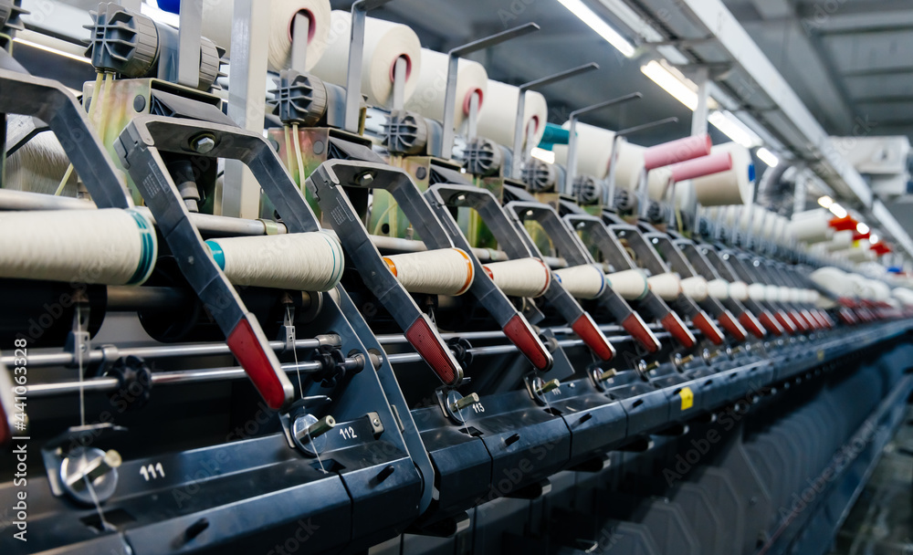 Textile factory equipment. manufacture of threads and yarns. Industrial concept. Textile factory equipment. manufacture of threads and yarns. Industrial concept.