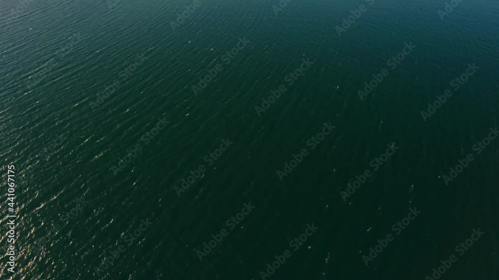 Epic Aerial View to Scenic Seascape and Hel Peninsula in Baltic Sea in Poland in Summer with Beach and Forest on Sunset. Travel and Vacation Destination in Europe. 4K Nature Drone Reveal Pedestal Shot Epic Aerial View to Scenic Seascape and Hel Peninsula in Baltic Sea in Poland in Summer with Beach and Forest on Sunset. Travel and Vacation Destination in Europe. 4K Nature Drone Reveal Pedestal Shot