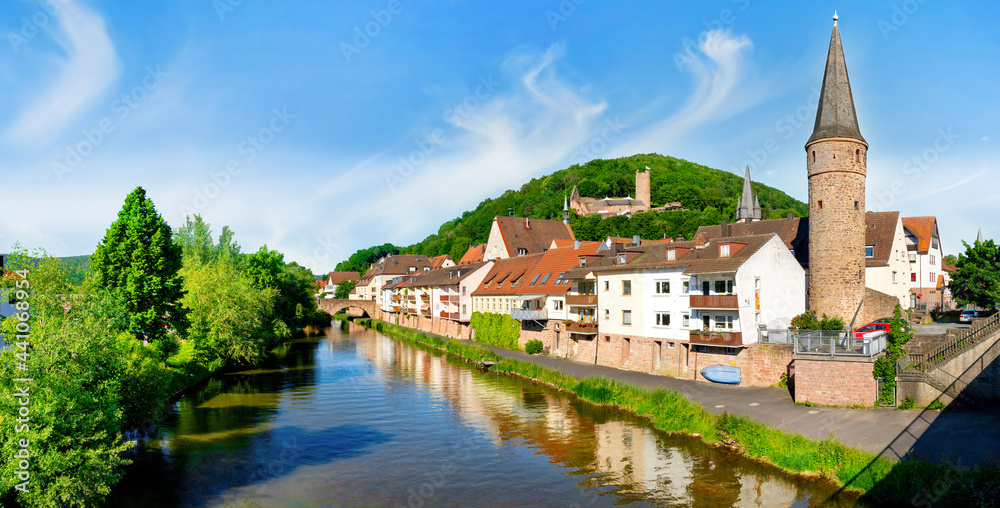 Cityscape of Gemünden with Main river, Hexenturm and Scherenburg ruin on the hill, Bavaria, Germany