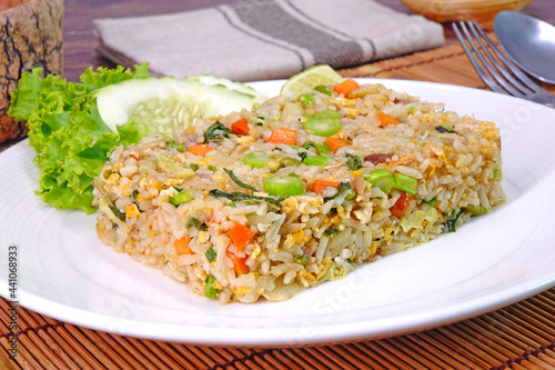 Yangzhou fried rice. Yangzhou fried rice is a popular Chinese-style wok fried rice dish in many Chinese restaurants throughout the world. (Special fried rice or House special fried rice)