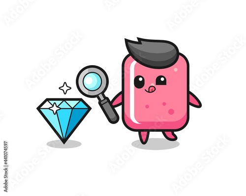 bubble gum mascot is checking the authenticity of a diamond