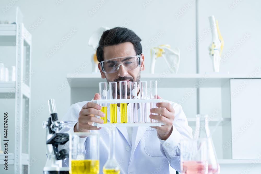 Male Scientist Looking Vaccine Male Scientist Looking Vaccine