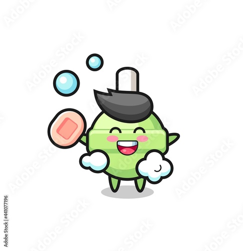 lollipop character is bathing while holding soap