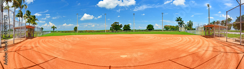 фотографія Perfectly groomed and manicured baseball field on a beautiful sunny day