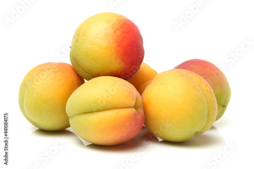 fresh apricots on white background.