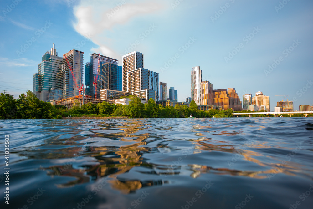 Naklejka premium Amazing Dramatic Austin Texas Sunset Mirror Town Lake Reflection with Colorful Cloud Reflecting on the Colorado River.